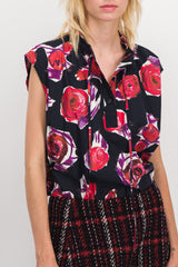 Sleeveless funnel neck flower printed top